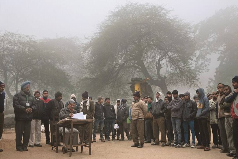 137. Contract workers at roll call on a winter morning_PHOTO CREDIT - Narendra Bisht courtesy Sahapedia(dot)org-min