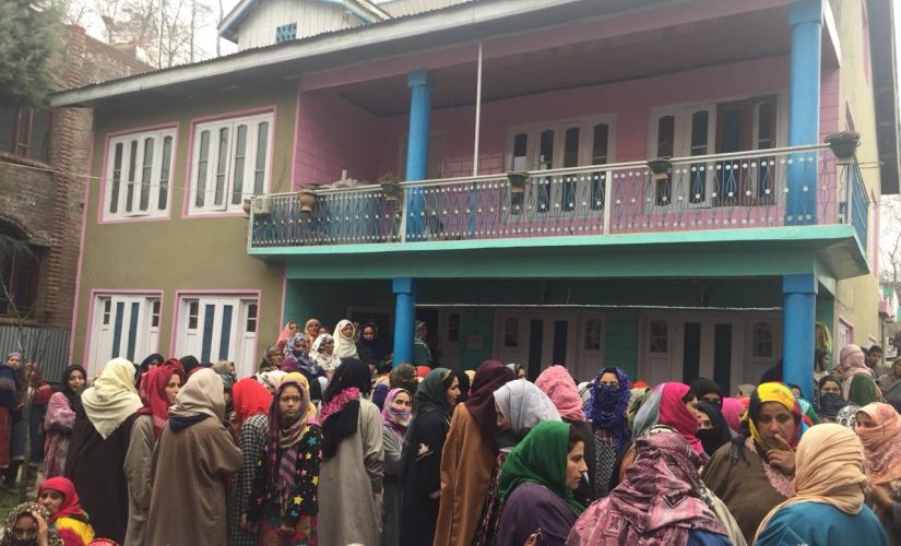 Rizwan's death triggered protests across Kashmir. In this photo, locals have gathered at Rizwan's home in Awantipora. Image/Sameer Yasir