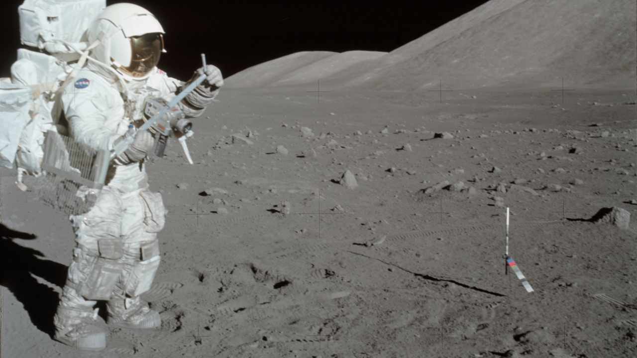 Scientist-astronaut Harrison Schmitt collecting lunar rake samples during the first Apollo 17. Schmitt was the lunar module pilot for the mission. The Lunar Rake is used to collect discrete samples of rocks and rock chips of different sizes. Image courtesy: NASA