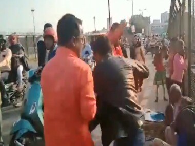 A screenshot from the video shared by Twitter user Prashant Kumar, showing the men beating up a Kashmiri man in Lucknow.