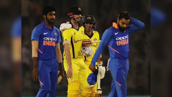India vs Australia: Flat deck and dew take the fizz out of hosts' bowlers in Mohali and leave them with early warning signal