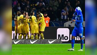 Bundesliga: Marco Reus sends Borussia Dortmund atop standings with late winner against Hertha Berlin; Schalke lose again