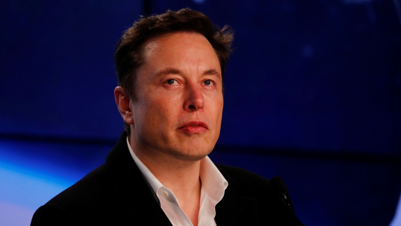Tesla CEO Elon Musk speaks at news conference. Reuters