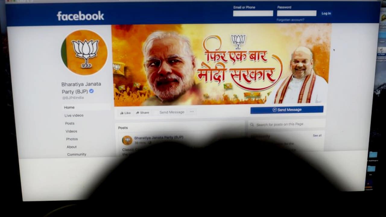A woman checks the Facebook page of India's ruling Bharatiya Janata Party. Image: AP