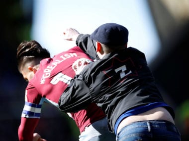 EFL Championship: Aston Villa midfielder Jack Grealish punched by pitch-invading fan in derby against Birmingham