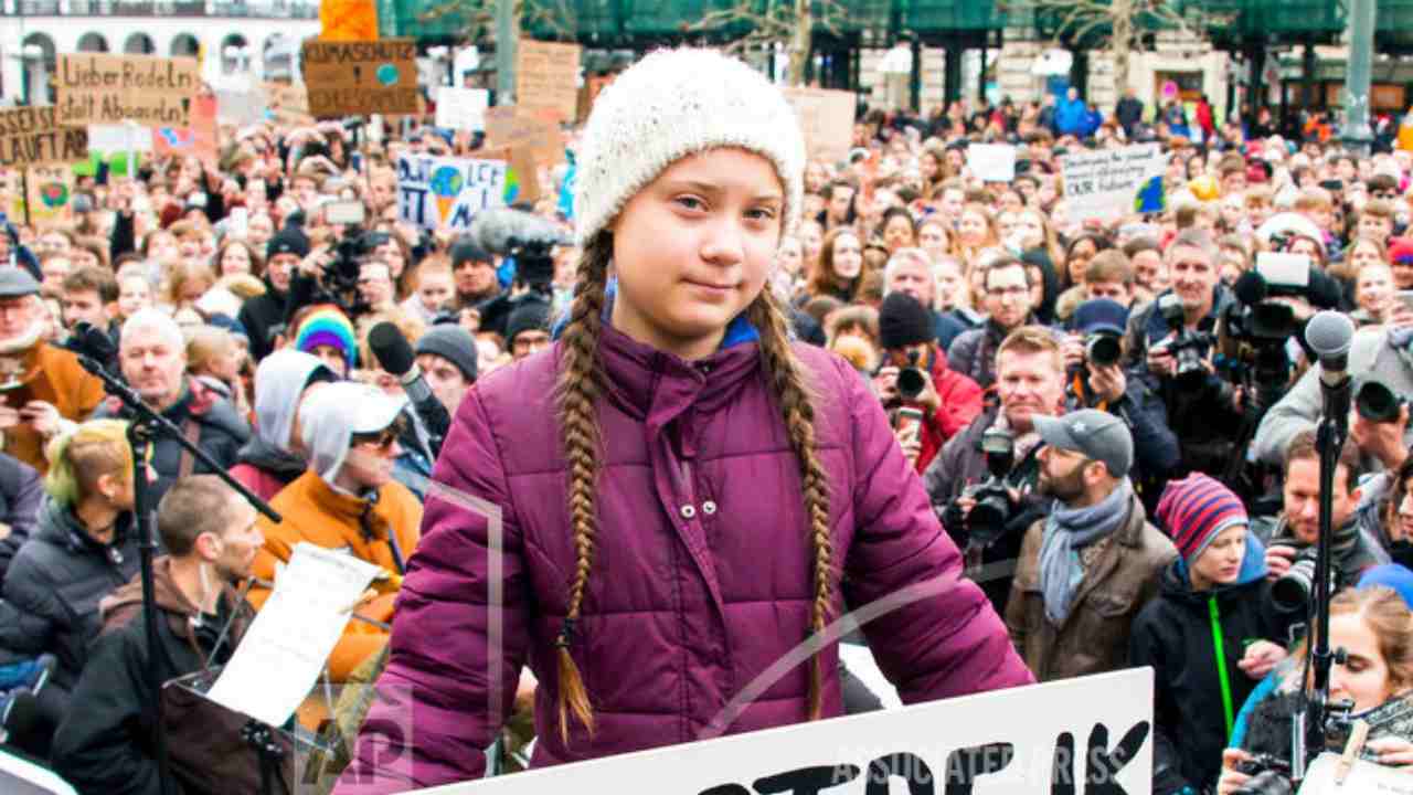 Swedish teenage climate activist Greta Thunberg with her 'School strike for Climate' sign