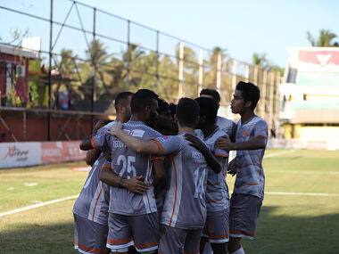 Chennai City FC players celebrate a goal against Churchill. Image courtesy: I-League