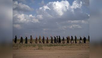 In Syria's Baghouz, last village under Islamic State control, militants remain organised and brutal to the bitter end