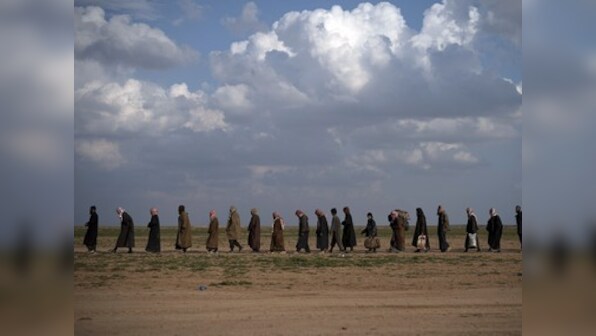 In Syria's Baghouz, last village under Islamic State control, militants remain organised and brutal to the bitter end