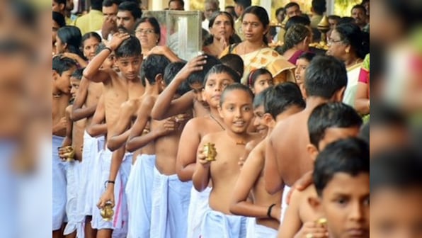 In Kerala's Chettikulangara Devi Temple, devotees set on defying ban on ritual involving piercing of boys with metal hooks