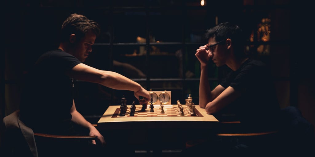 The dark side of chess: Payoffs, points and 12-year-old grandmasters