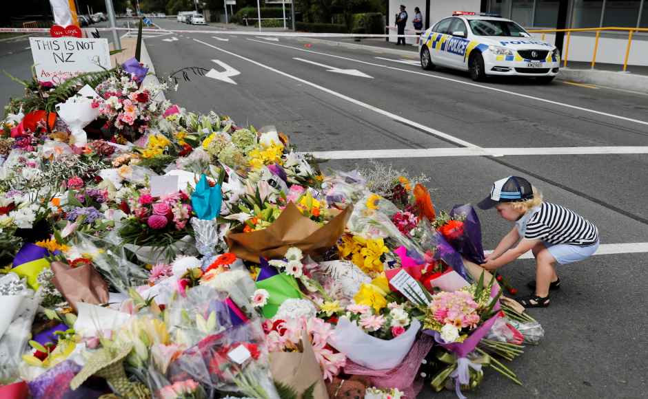 A day after deadly shootings at two mosques in New Zealand's Christchurch, where 49 Muslims were killed, people across the nation took to the streets to offer their condolences. Reuters A day after deadly shootings at two mosques in New Zealand's Christchurch, where 49 Muslims were killed, people across the nation took to the streets to offer their condolences. Reuters