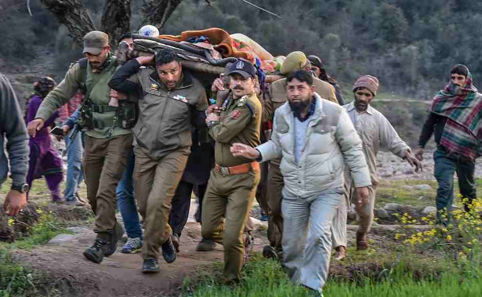 Police officials and locals carry an injured for treatment to a hospital after firing and mortar shelling by the Pakistani Army along the LoC in Krishna Ghati sector of Jammu and Kashmir on Thursday. PTI Police officials and locals carry an injured for treatment to a hospital after firing and mortar shelling by the Pakistani Army along the LoC in Krishna Ghati sector of Jammu and Kashmir on Thursday. PTI