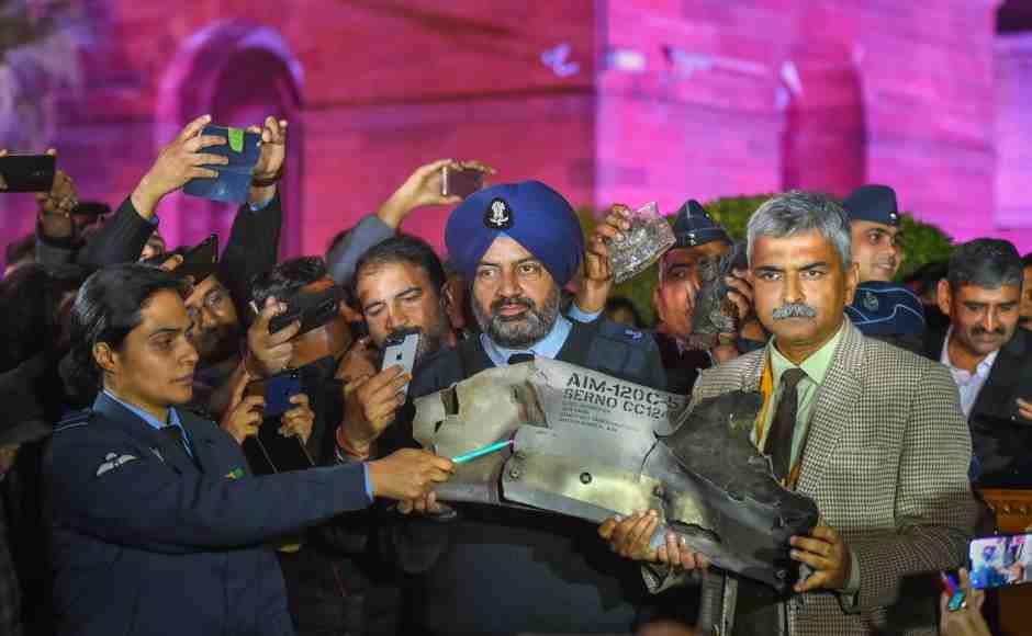 Indian Air Force officials show sections of an exploded Amraam missile, said to be fired by Pakistan Air Force F-16, at the IAF, Army and Navy joint press conference. PTI Indian Air Force officials show sections of an exploded Amraam missile, said to be fired by Pakistan Air Force F-16, at the IAF, Army and Navy joint press conference. PTI