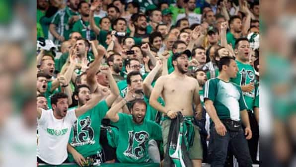 Panathinaikos docked three points, fined $107,000 for fan violence in abandoned match against Olympiakos