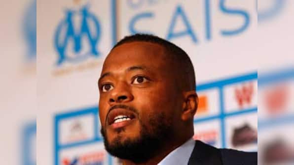 Gay rights groups file legal complaints against former Manchester United player Patrice Evra over homophobic insults to PSG players