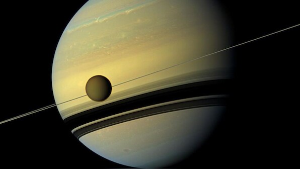 NASA's Cassini reveals details of a collection of mini-moons nestled between Saturn's rings