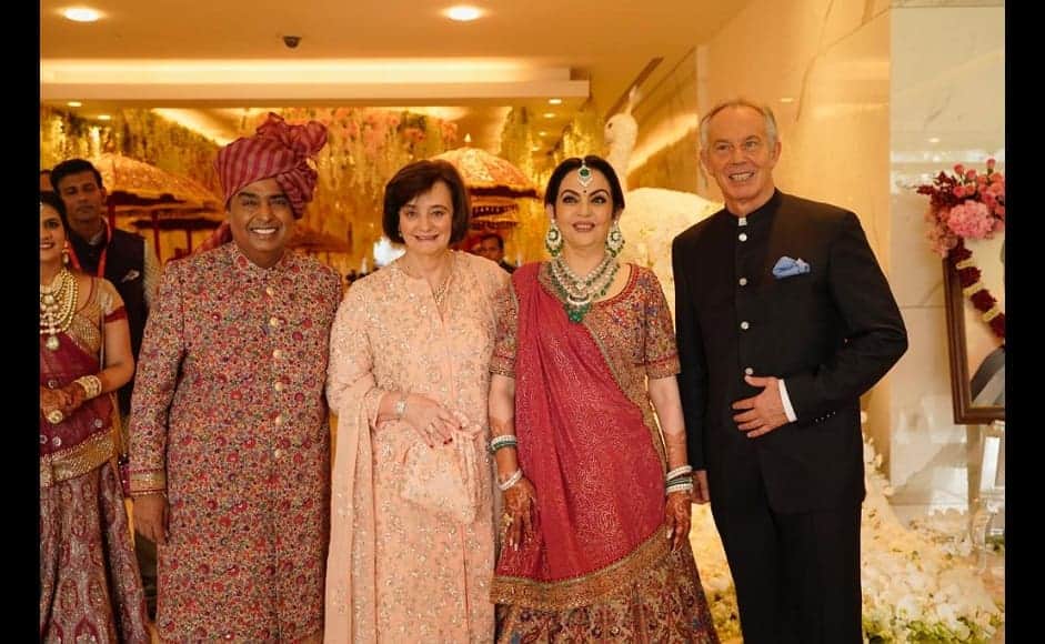 Former British Prime Minister Tony Blair and his wife Cherie Blair pose with the Mukesh and Nita Ambani.