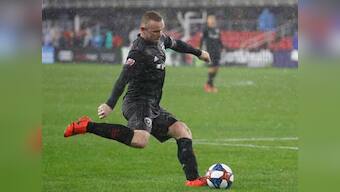 MLS: Wayne Rooney's DC United defeat defending champions Atlanta United in rain-hit season opener