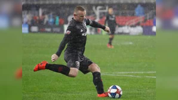 MLS: Wayne Rooney's DC United defeat defending champions Atlanta United in rain-hit season opener