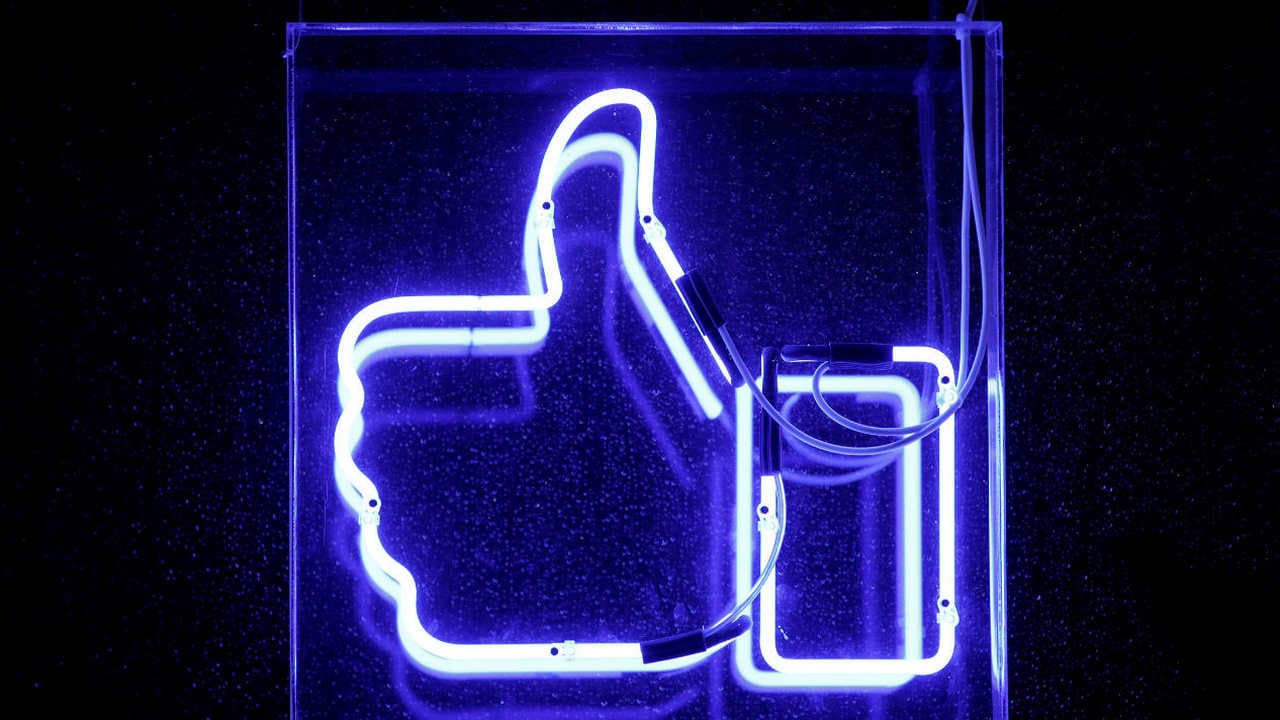 Facebook Like icon.