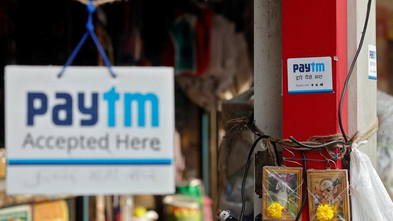 Advertisements of Paytm, a digital wallet company, are seen placed at stalls. Reuters