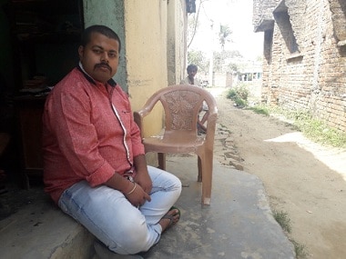 Rajiv Choudhary has completed his BTech, but spends his time getting fodder for the livestock on this family's farm. Firstpost/Parth MN