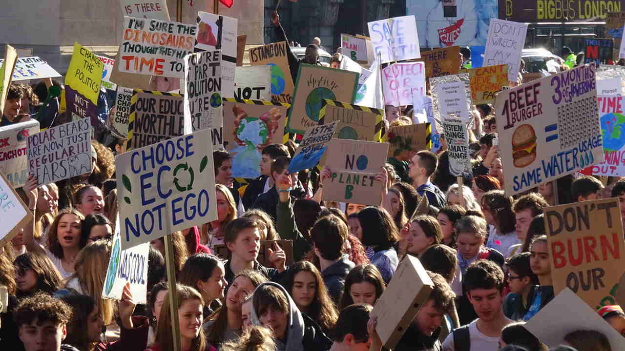 People protesting and creating awareness for climate change in London. Image Credit: Flickr