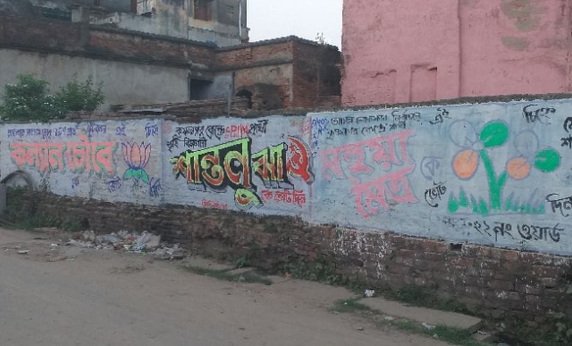 While a wall opposite the Kali temple shows graffiti for all three parties in companionable proximity, the campaign has not been as decorous. Image by Sandip Roy