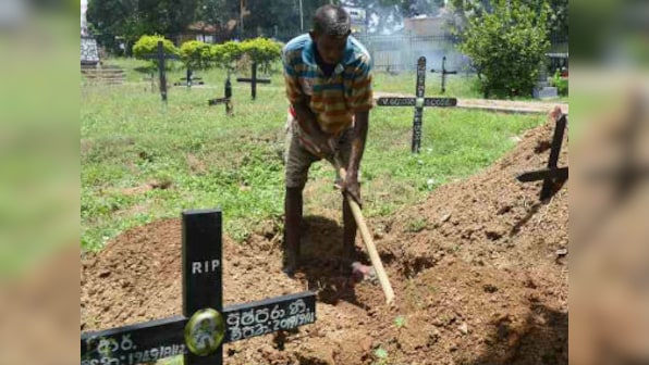 Sri Lanka blasts: Grave digger speaks of 'struggle to steady hands' while preparing to bury infant