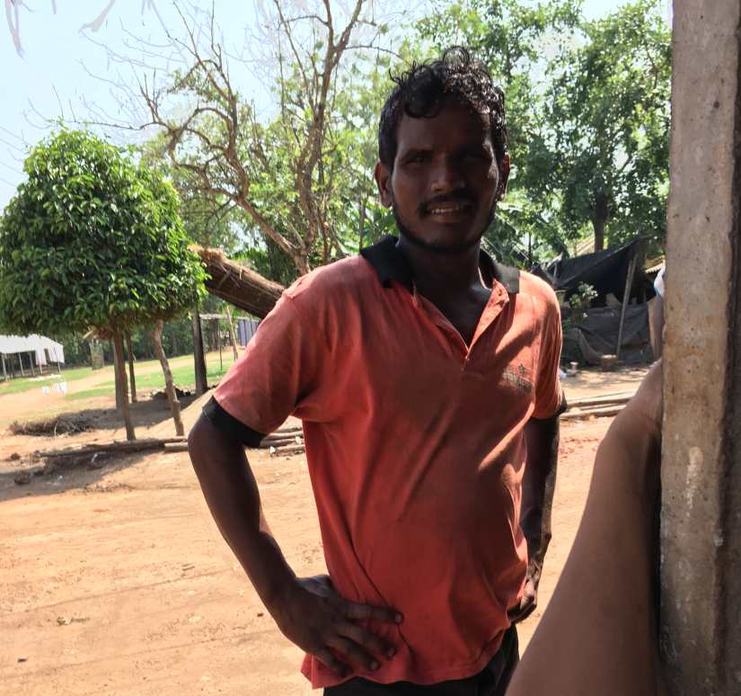 A man smiles for the camera at Gopiballabpur village in Jhargram. Kuhu Mitra