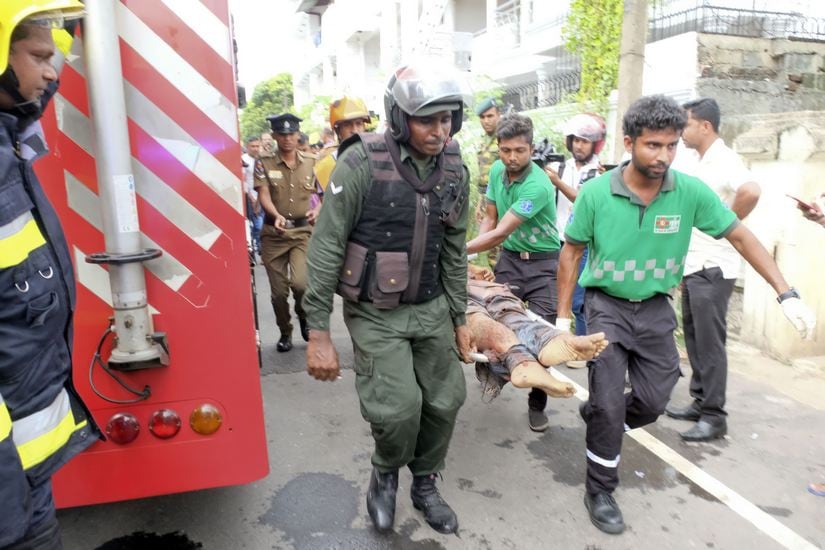 Injured being moved from the site of a blast at Dematagoda, Colombo. A Gamage/101Reporters