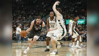 NBA: Joe Harris' late three-pointer against Bucks boosts Nets' playoff push; Joel Embiid-led 76ers dominate Bulls