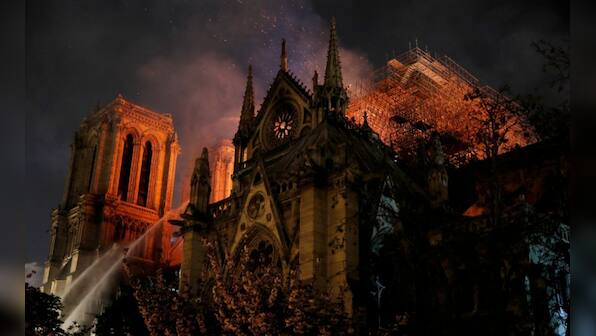 Notre-Dame fire: World expresses grief over loss of heritage as Paris's famous cathedral structure goes up in flames