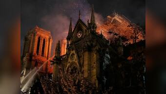 Notre-Dame fire: Paris official says cathedral's main structure 'saved and preserved', blaze 'decreasing' in intensity