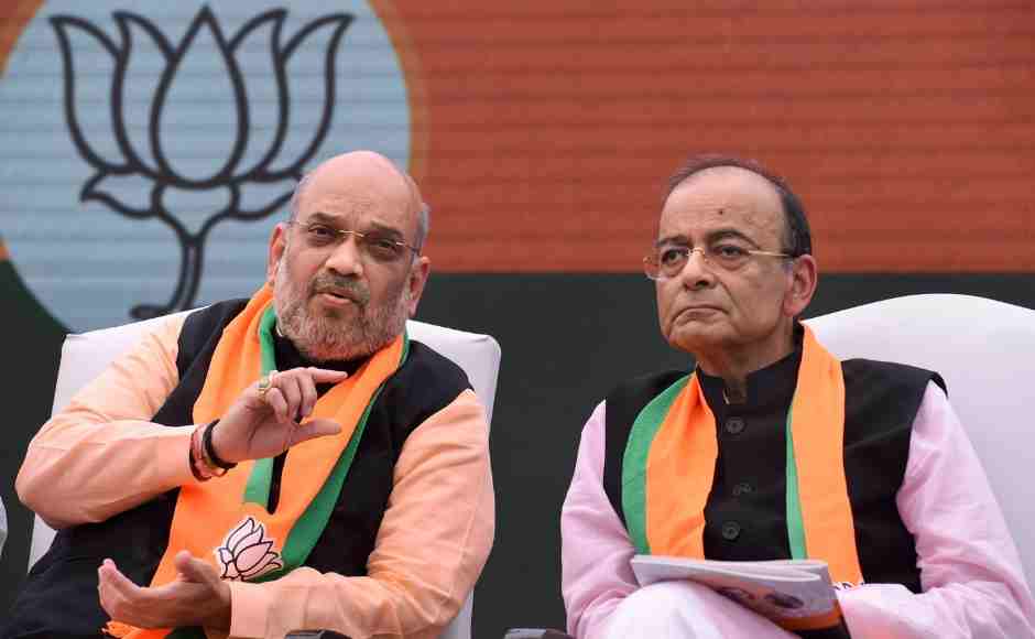 BJP President Amit Shah and Union Finance Minister Arun Jaitley during the release of BJP manifesto (Sankalp Patra). PTI BJP President Amit Shah and Union Finance Minister Arun Jaitley during the release of BJP manifesto (Sankalp Patra). PTI
