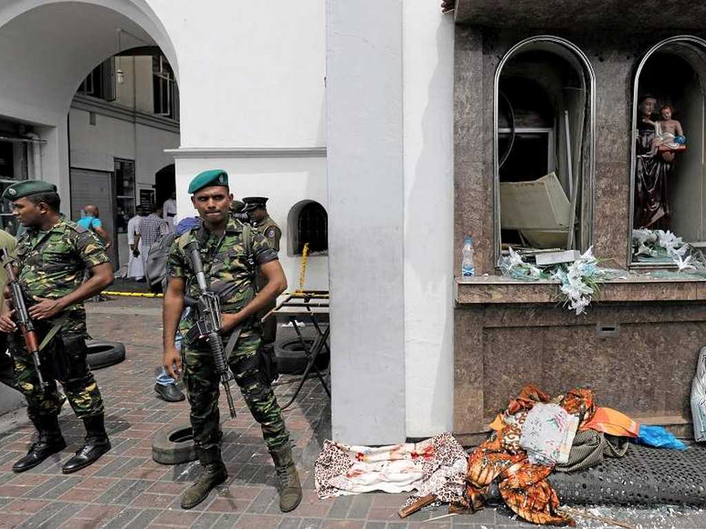 Sri Lankan military officials stand guard in front of the St. Anthony's Shrine, Kochchikade church after an explosion in Colombo, Sri Lanka. Reuters
