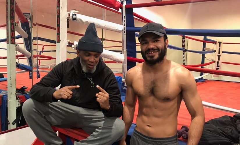 Vikas Krishan with his coach Wali Moses, who is also the grandfather of 2016 Olympic silver medalist Shakur Stevenson. Image courtesy: Top Rank Boxing