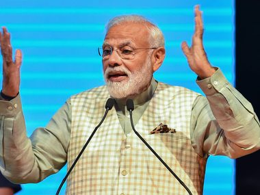 Narendra Modi promises collateral-free loan, insurance, pension in re-election pitch to business community Narendra Modi promises collateral-free loan, insurance, pension in re-election pitch to business community