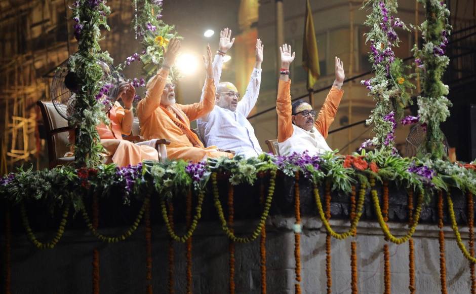 The nearly 4-hour roadshow ended at the Dashashwamedh Ghat where Modi took part in the Ganga aarti along with Amit Shah and Adityanath. Twitter/@BJP4India The nearly 4-hour roadshow ended at the Dashashwamedh Ghat where Modi took part in the Ganga aarti along with Amit Shah and Adityanath. Twitter/@BJP4India