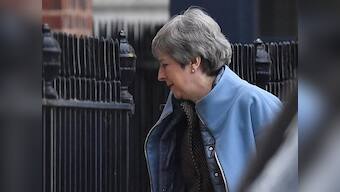 Theresa May hailed for dogged determination to deliver on Brexit through crisis, but UK PM demits office ‘without a legacy’