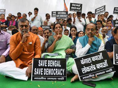 Bengal poll violence: As BJP leaders hold silent protest in Delhi's Jantar Mantar, party workers send messages loaded with Hindutva