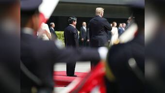 Donald Trump becomes first foreign leader to meet Japan's new Emperor Naruhito: Shinzo Abe hopes 'honour' will charm US president ahead of thorny trade talks