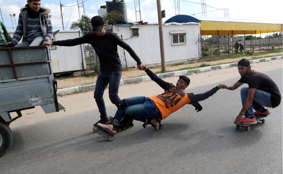 Gaza Skate Team members, Mohammad Al-Sawalhe, 23, and Mustafa Sarhan, 19, practising in Gaza. Reuters/Mohammed Salem. Gaza Skate Team members, Mohammad Al-Sawalhe, 23, and Mustafa Sarhan, 19, practising in Gaza. Reuters/Mohammed Salem.