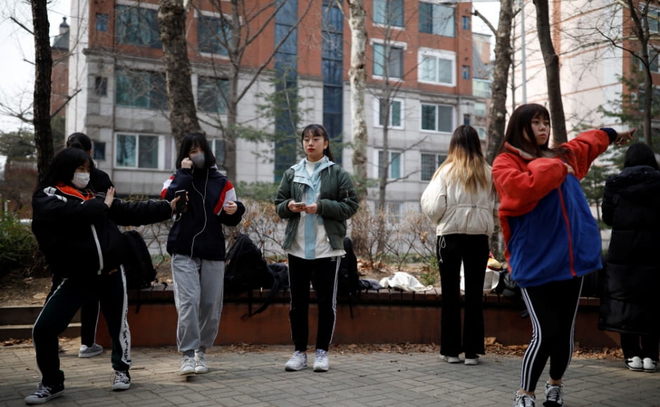 Japanese children warm up for an audition at a park in Seoul, South Korea. Reuters/Kim Hong-Ji. Japanese children warm up for an audition at a park in Seoul, South Korea. Reuters/Kim Hong-Ji.