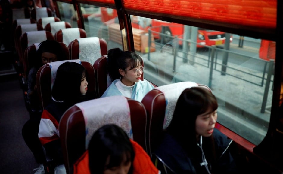 Nao Niitsu, college freshman from Tokyo, who wants to be a K-pop star, and other Japanese children sit on a bus heading for an audition in Seoul, South Korea, on 15 March, 2019. During a visit to Seoul paid for by her mother, herself a die-hard BTS fan, Niitsu auditioned for 10 agencies and was accepted by five. Reuters/Kim Hong-Ji. Nao Niitsu, college freshman from Tokyo, who wants to be a K-pop star, and other Japanese children sit on a bus heading for an audition in Seoul, South Korea, on 15 March, 2019. During a visit to Seoul paid for by her mother, herself a die-hard BTS fan, Niitsu auditioned for 10 agencies and was accepted by five. Reuters/Kim Hong-Ji.