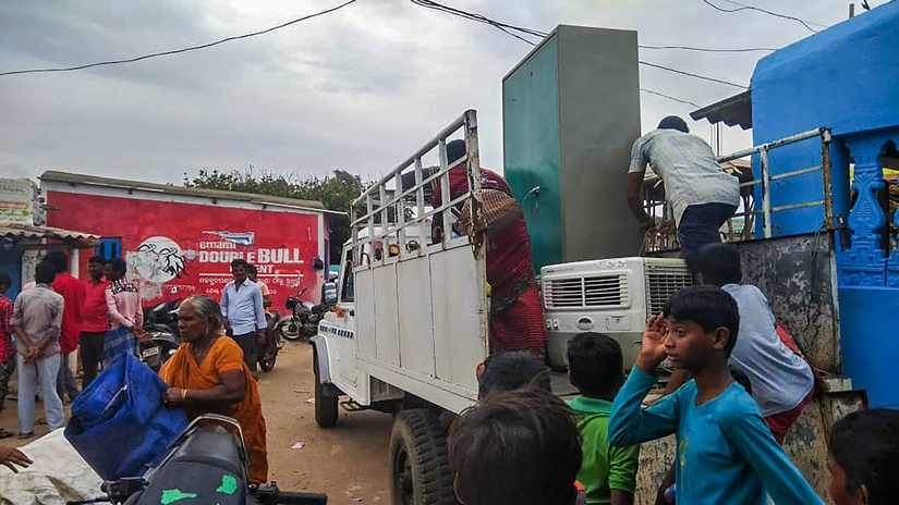 Villagers living in vulnerable low-lying areas being shifted to cyclone shelter house, in Puri. PTI