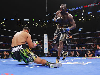 Undefeated Deontay Wilder knocks out Dominic Breazeale in first round to retain WBC heavyweight title Undefeated Deontay Wilder knocks out Dominic Breazeale in first round to retain WBC heavyweight title