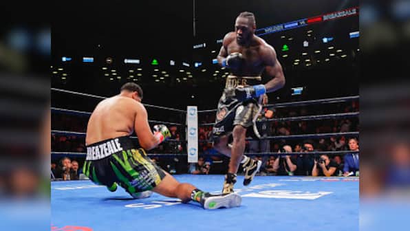 Undefeated Deontay Wilder knocks out Dominic Breazeale in first round to retain WBC heavyweight title
