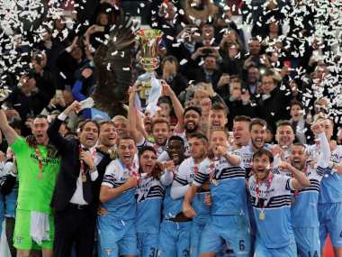 Coppa Italia: Lazio lift trophy after two late goals help them beat Atlanta as fan violence mars final